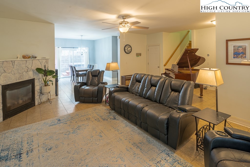778 Roby Poe Road Crumpler, NC 28617 - Photo 9 of 50 a living room with furniture and a fireplace