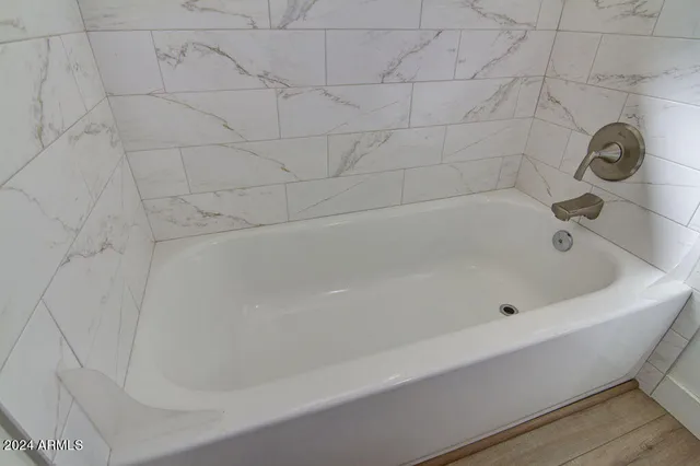 a bathroom with a bathtub