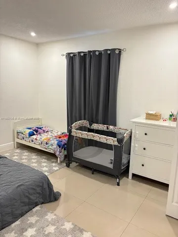 a view of a backyard with a garden