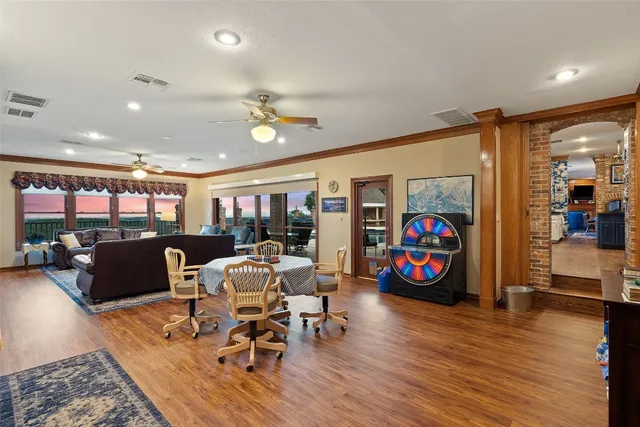 a very nice looking living room with furniture and a flat screen tv