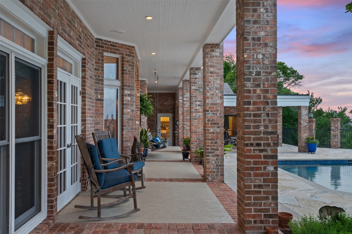 12 Hedge Lane Austin, TX 78746 - Photo 26 of 30 a front view of a house with outdoor seating