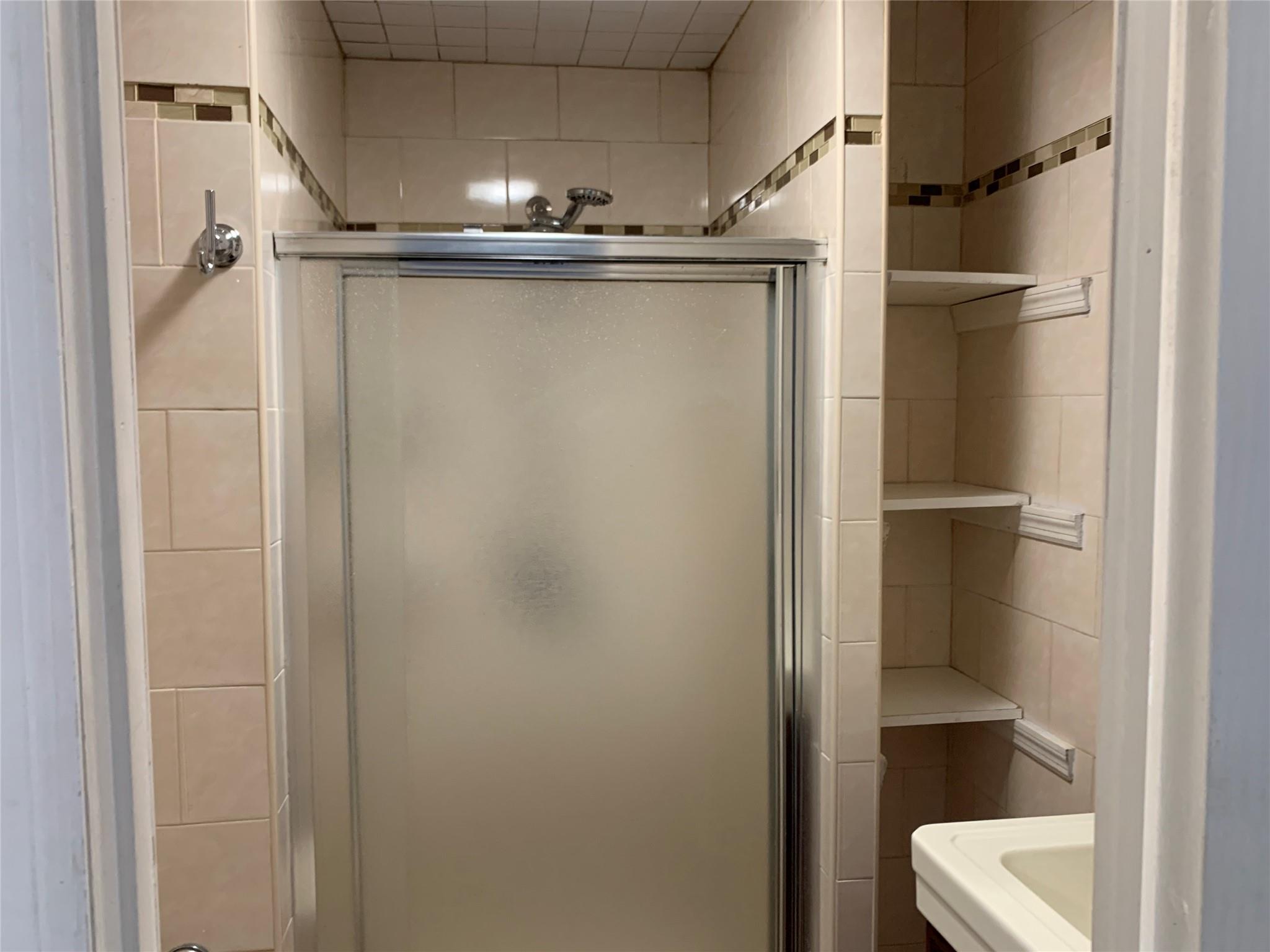 87-33 Commonwealth Boulevard Queens, NY 11426 - Photo 13 of 28 a view of walk in closet