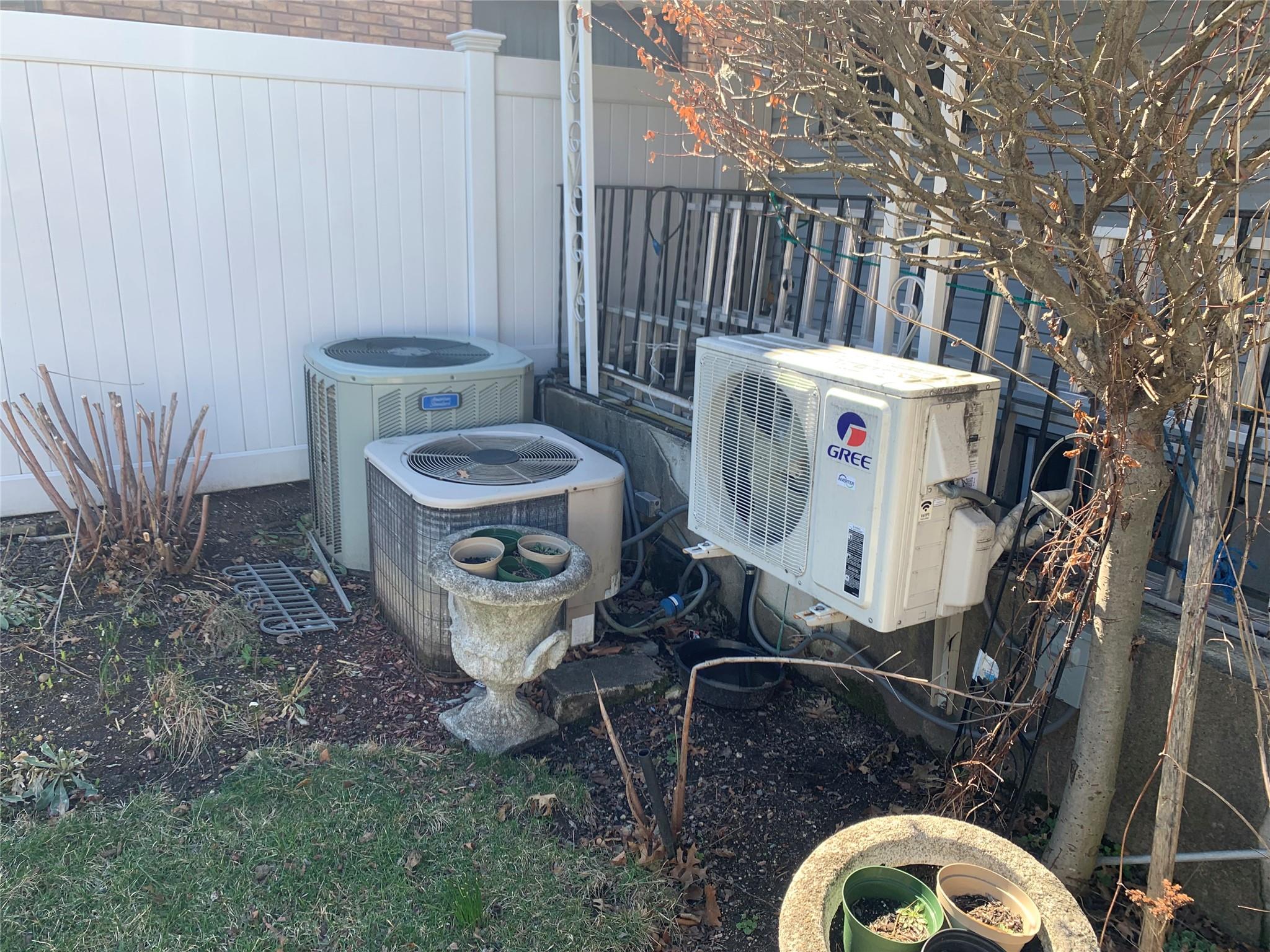 87-33 Commonwealth Boulevard Queens, NY 11426 - Photo 5 of 28 a utility room with dryer and washer