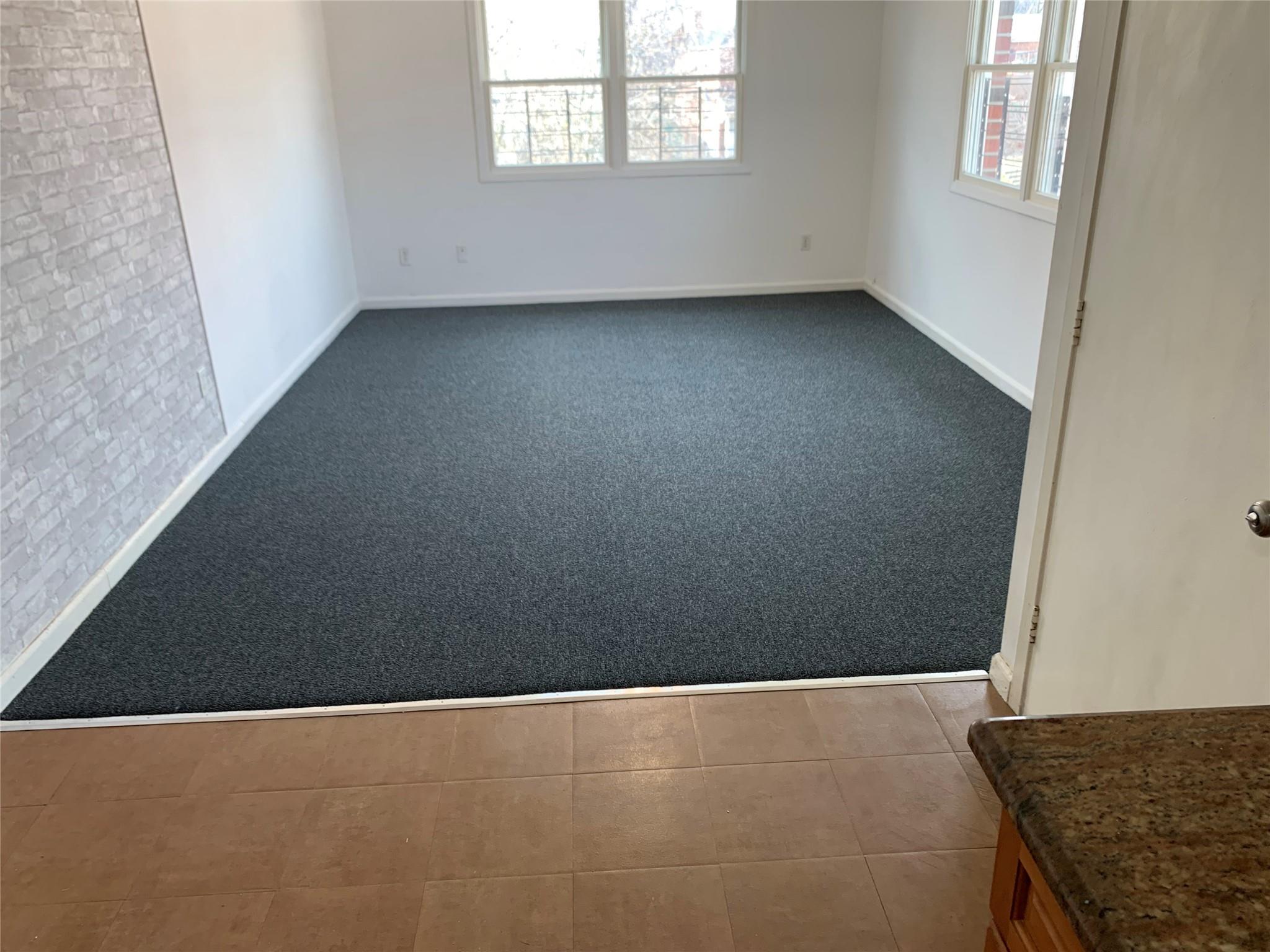 87-33 Commonwealth Boulevard Queens, NY 11426 - Photo 7 of 28 an empty room with windows