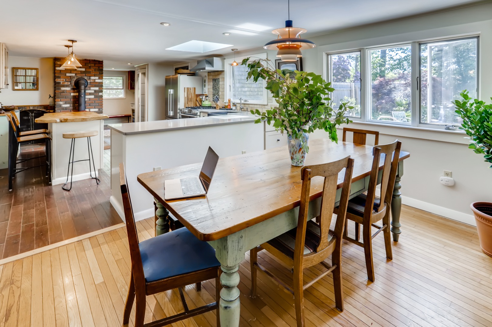 377 State Road West Tisbury, MA 02568 - Photo 11 of 36 a view of a dining room with furniture window and wooden floor