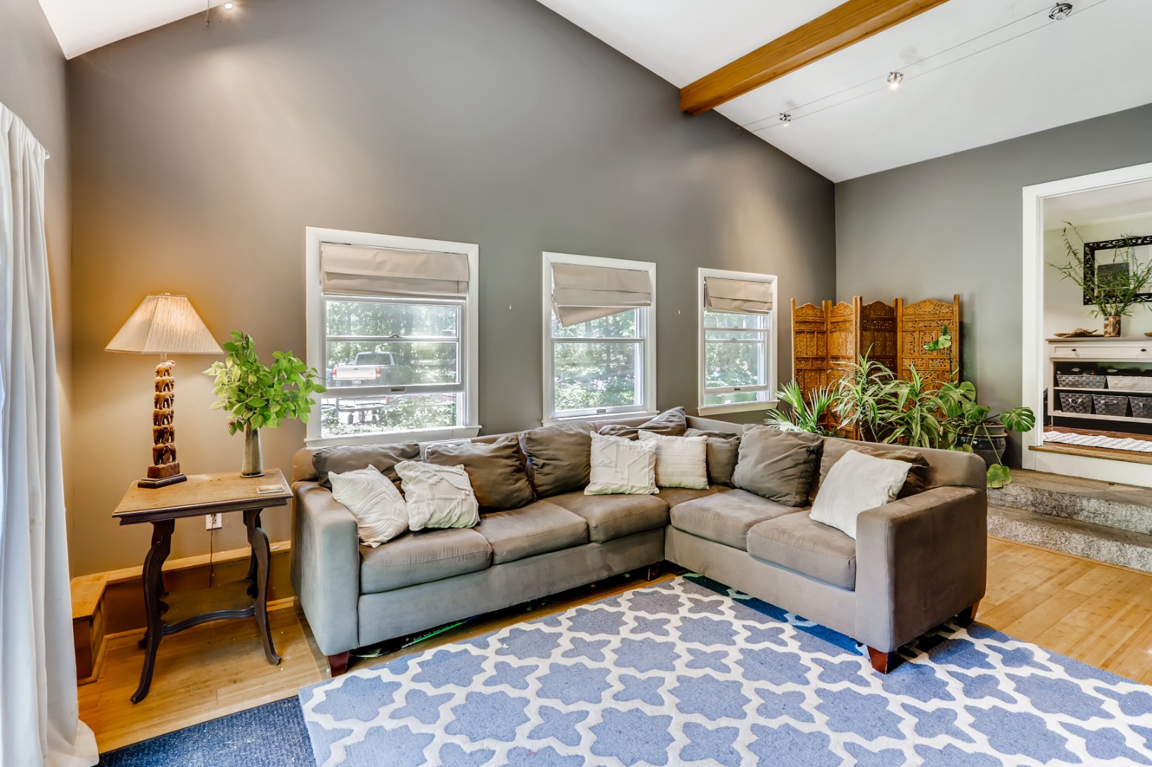 377 State Road West Tisbury, MA 02568 - Photo 13 of 36 a living room with furniture and a large window