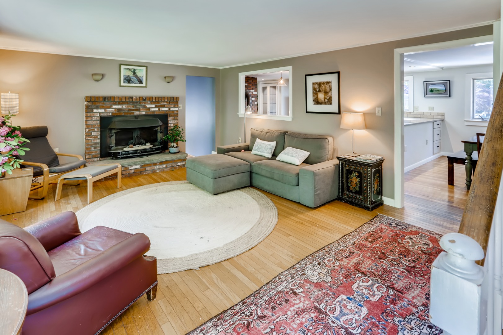 377 State Road West Tisbury, MA 02568 - Photo 14 of 36 a living room with furniture and a fireplace