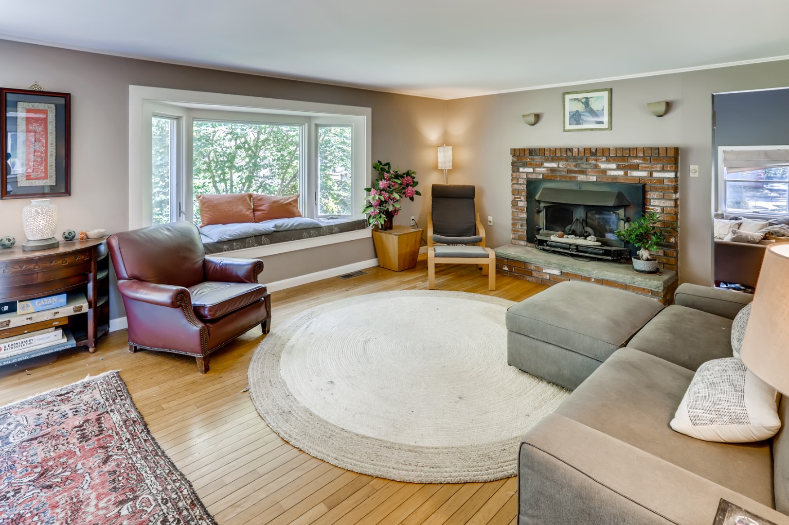 377 State Road West Tisbury, MA 02568 - Photo 15 of 36 a living room with furniture and a fireplace