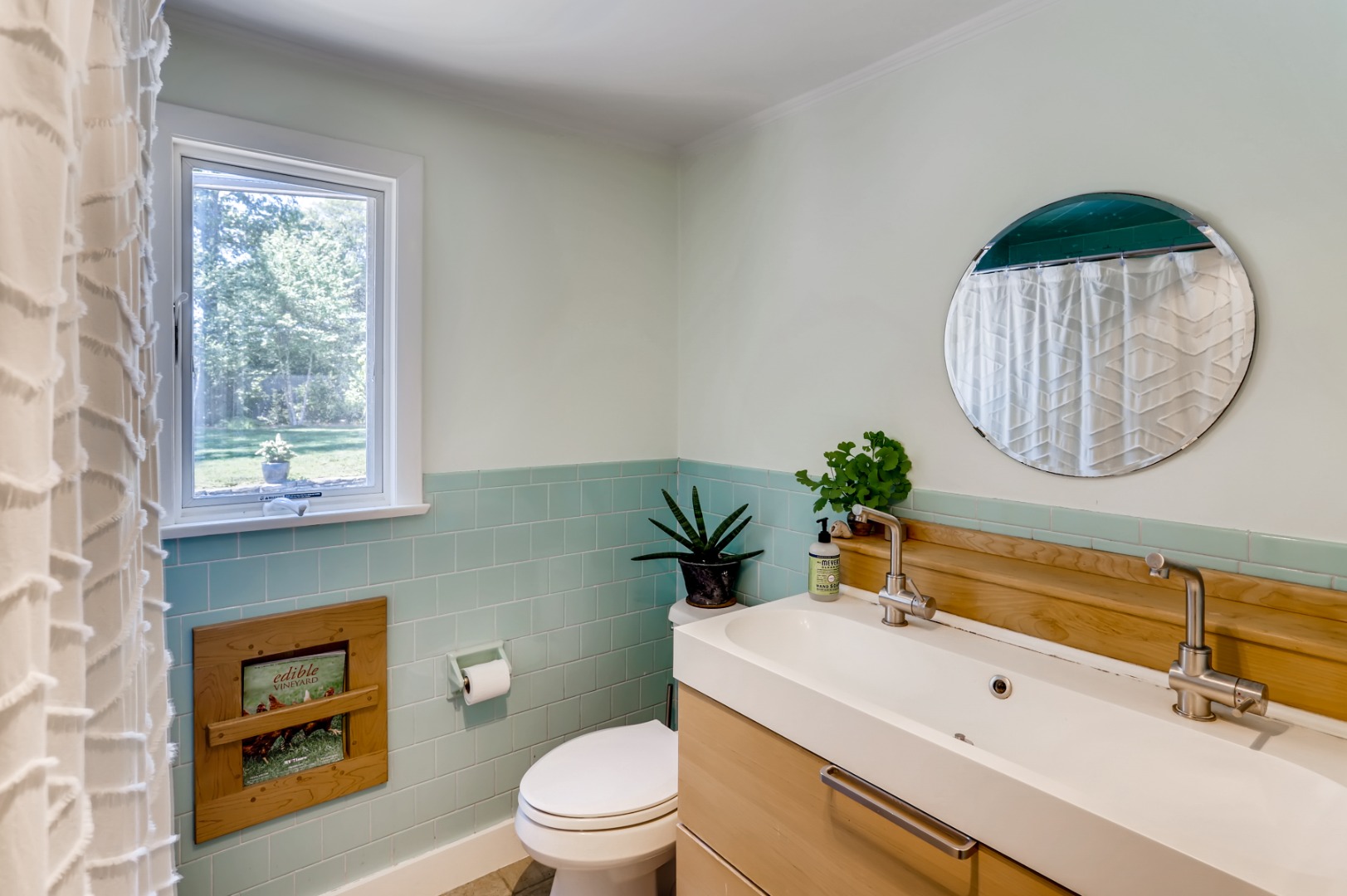377 State Road West Tisbury, MA 02568 - Photo 17 of 36 a bathroom with a sink a toilet and a mirror