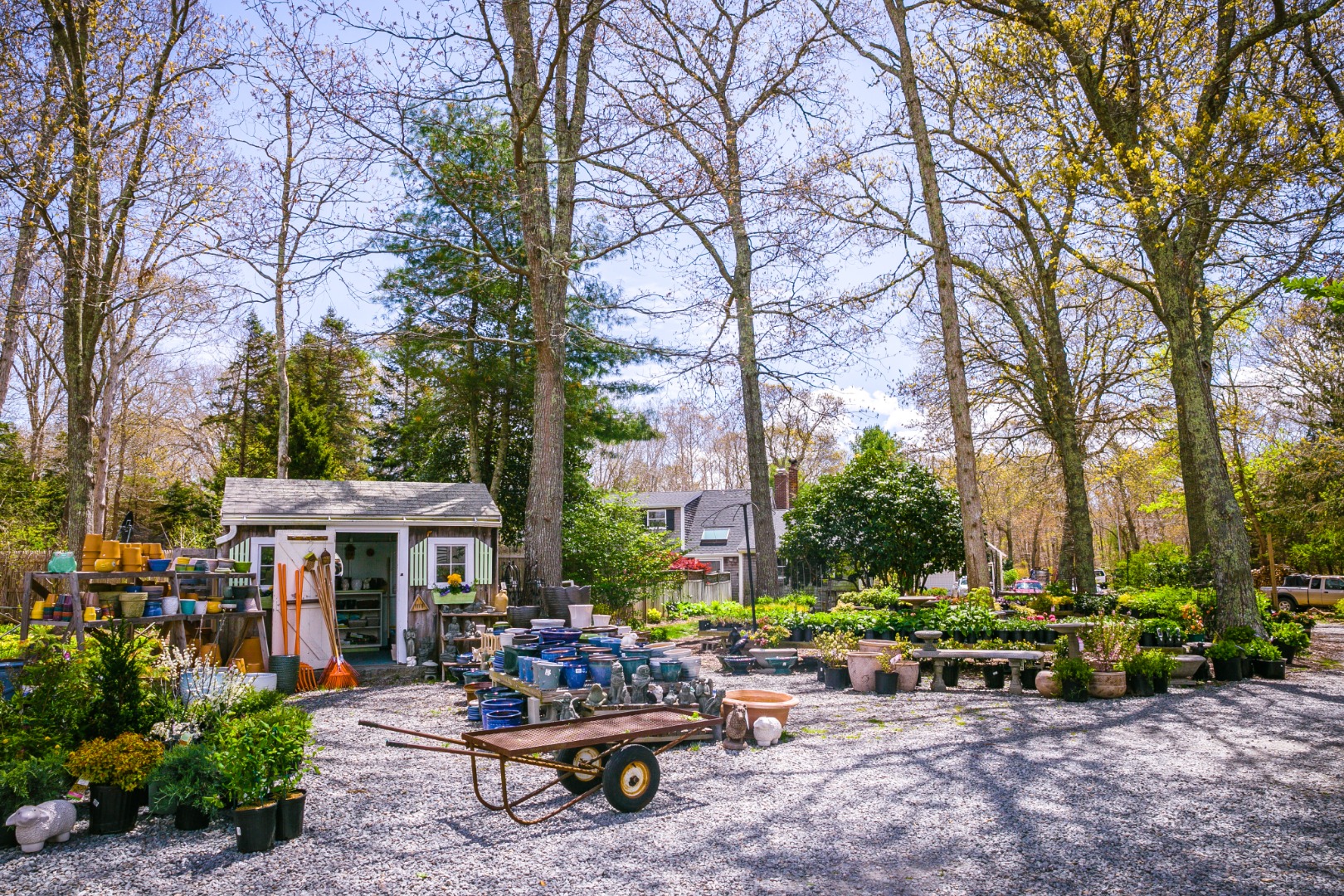 377 State Road West Tisbury, MA 02568 - Photo 30 of 36 a view of a patio with table and chairs under an umbrella