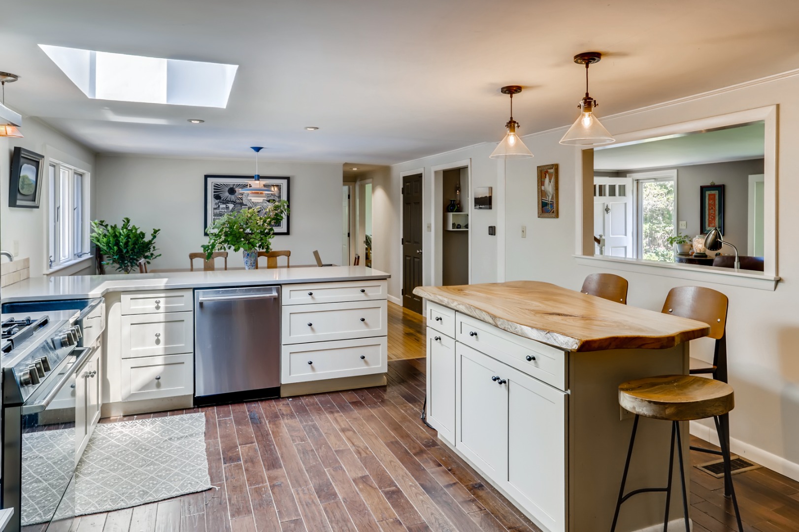 377 State Road West Tisbury, MA 02568 - Photo 9 of 36 a kitchen with a stove a sink and a refrigerator