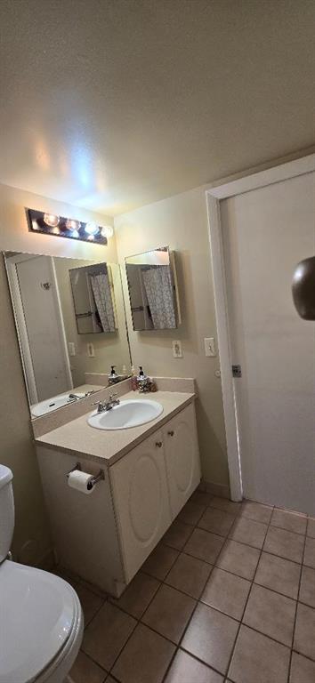 301 Palm Way, Unit 107 Pembroke Pines, FL 33025 - Photo 21 of 36 a bathroom with a sink toilet and shower
