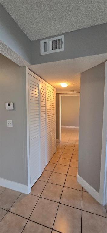 301 Palm Way, Unit 107 Pembroke Pines, FL 33025 - Photo 23 of 36 a view of an empty room and window
