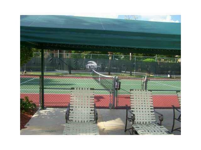 301 Palm Way, Unit 107 Pembroke Pines, FL 33025 - Photo 30 of 36 a house view with a outdoor space