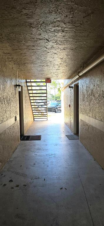 301 Palm Way, Unit 107 Pembroke Pines, FL 33025 - Photo 36 of 36 a view of a room with wooden walls