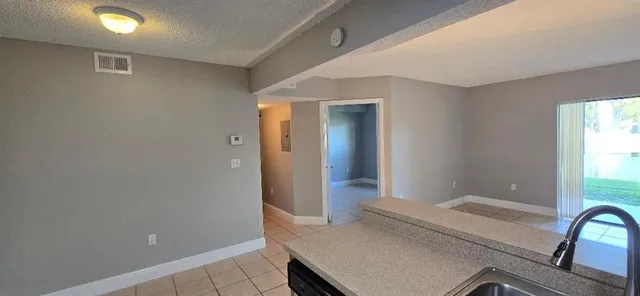 a bathroom with a tub and shower