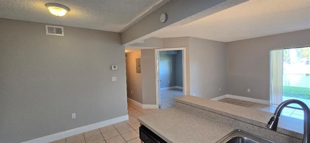 301 Palm Way, Unit 107 Pembroke Pines, FL 33025 - Photo 8 of 36 a bathroom with a tub and shower