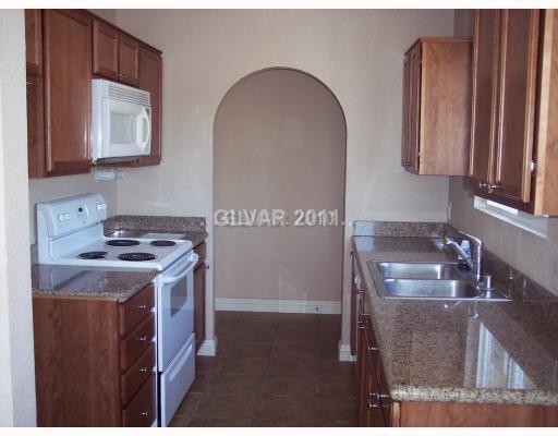 1828 North Decatur Boulevard, Unit 102 Las Vegas, NV 89108 - Photo 1 of 12 Kitchen.