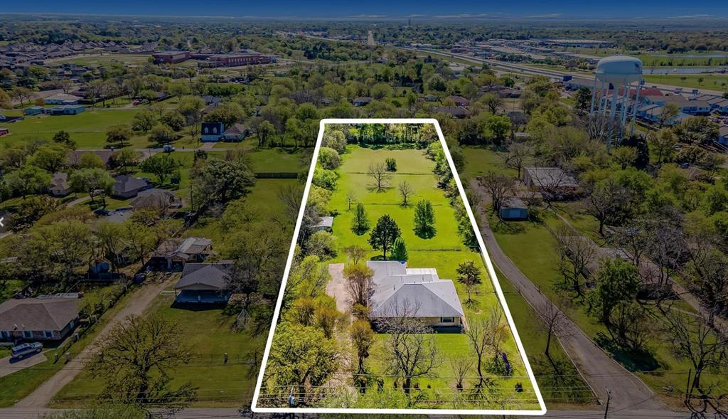 402 East Simonds Road Seagoville, TX 75159 - Photo 1 of 1 Aerial view of residential area featuring property boundaries highlighted