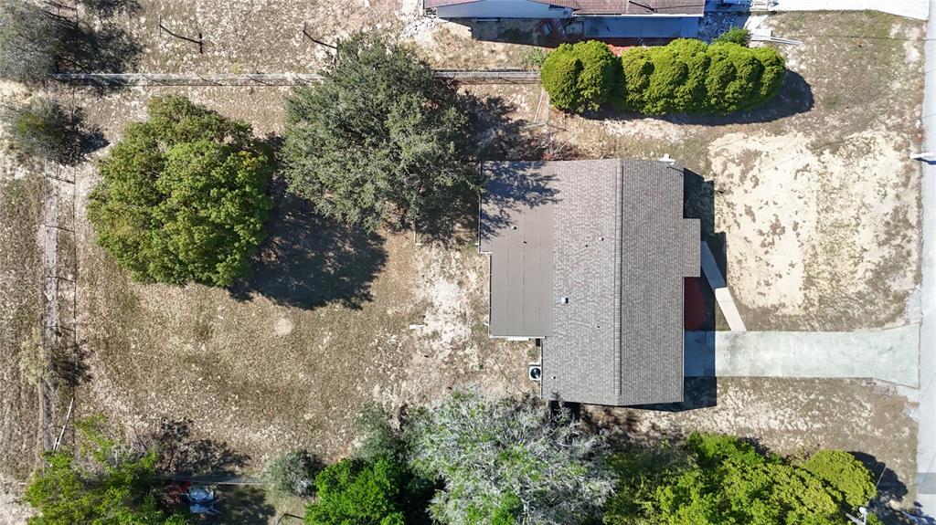 13156 Odham Street Spring Hill, FL 34609 - Photo 2 of 54 a picture of a yard