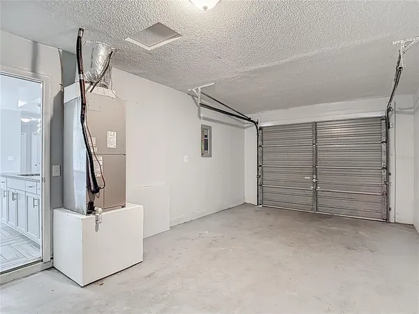 a house that has a tree in front of it