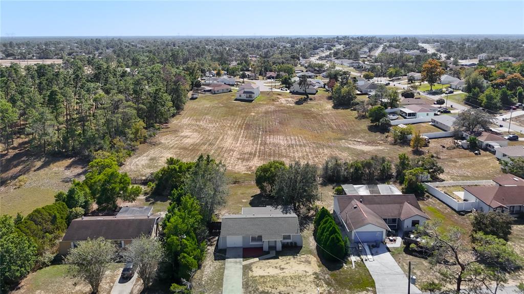 13156 Odham Street Spring Hill, FL 34609 - Photo 46 of 54 an aerial view of multiple house