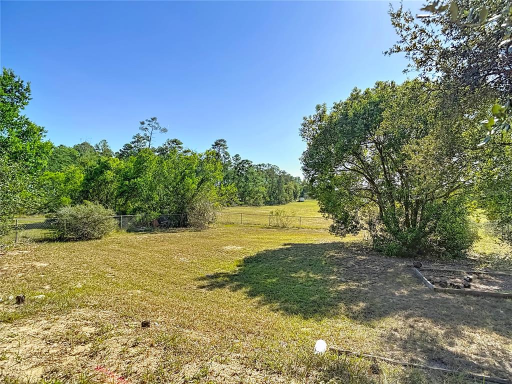 13156 Odham Street Spring Hill, FL 34609 - Photo 52 of 54 a view of an ocean and beach