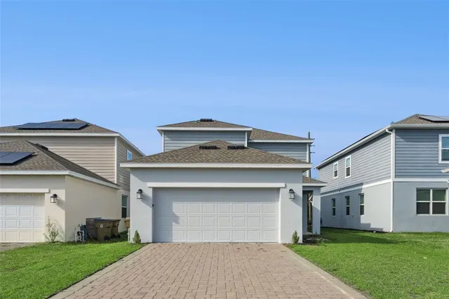 a house view with a garden space