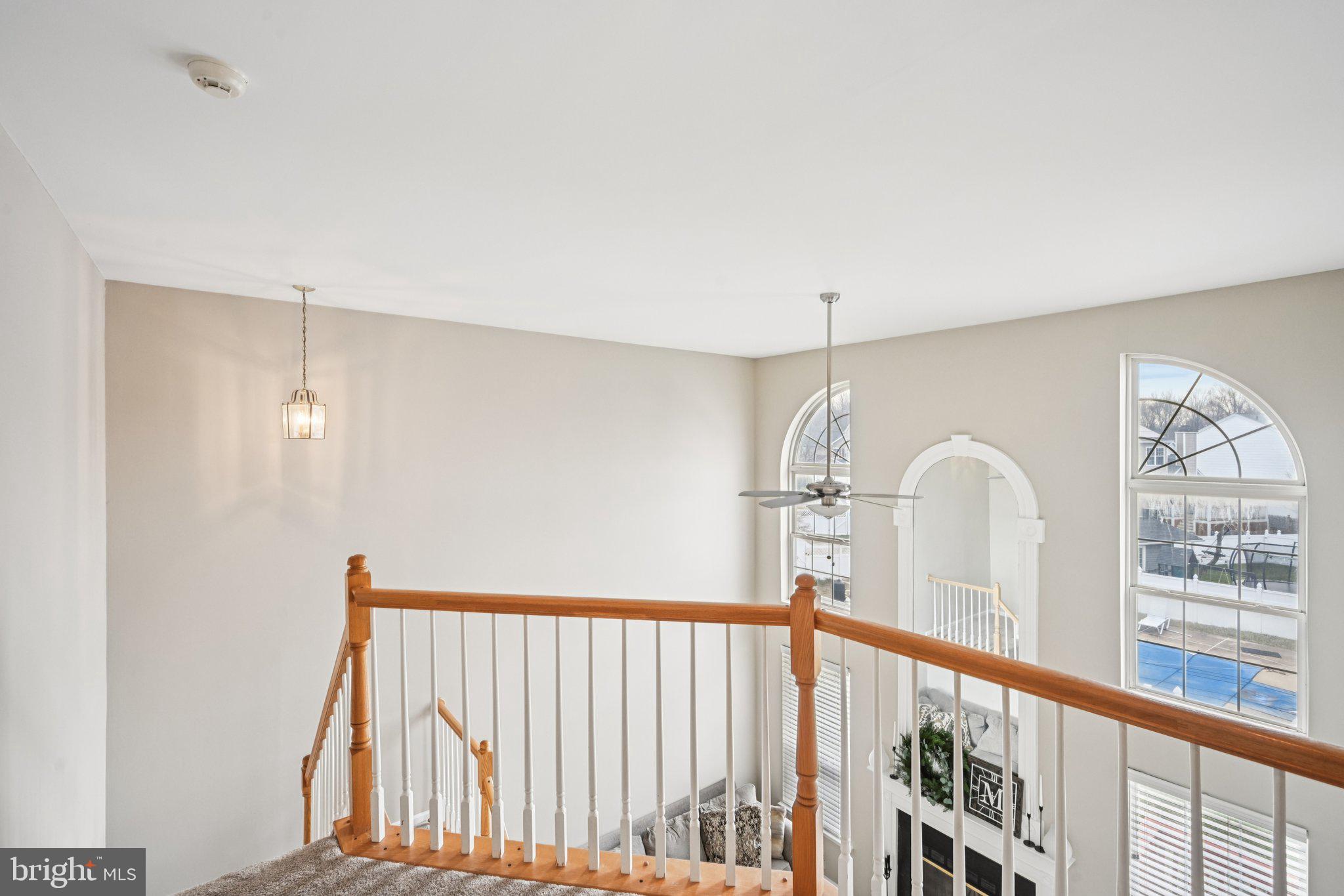 4 Cheyenne Court Burlington, NJ 08016 - Photo 14 of 34 a view of a hallway with windows
