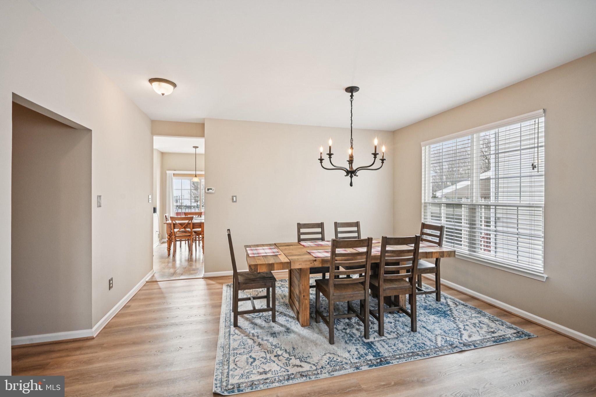 4 Cheyenne Court Burlington, NJ 08016 - Photo 5 of 34 a view of a dining room with furniture window and wooden floor