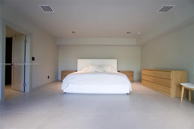 a bedroom with a bed and closet