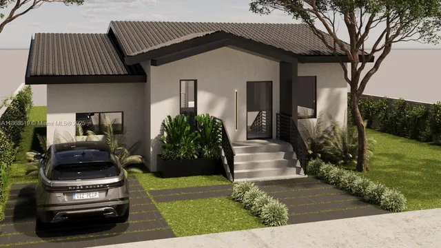 a front view of a house with a garden