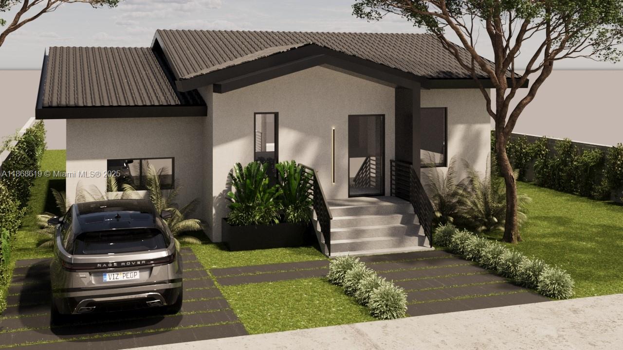 2155 Southwest 25th Terrace Miami, FL 33133 - Photo 20 of 20 a front view of a house with a garden