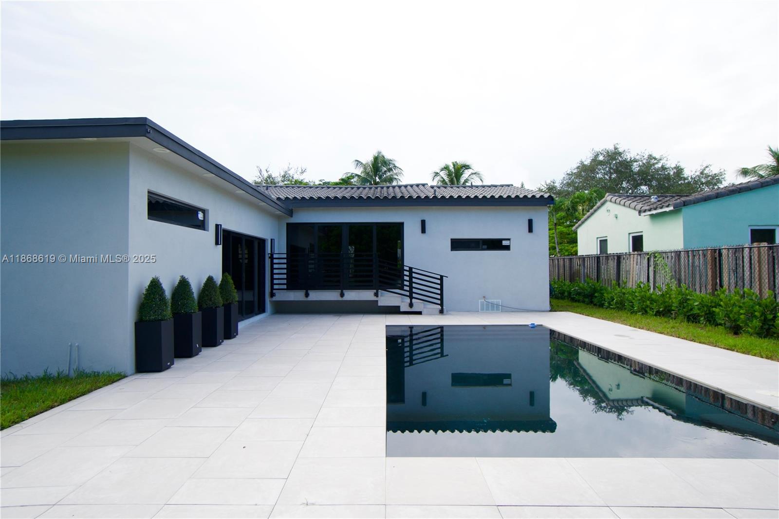 2155 Southwest 25th Terrace Miami, FL 33133 - Photo 2 of 20 a view of a house with backyard and sitting area