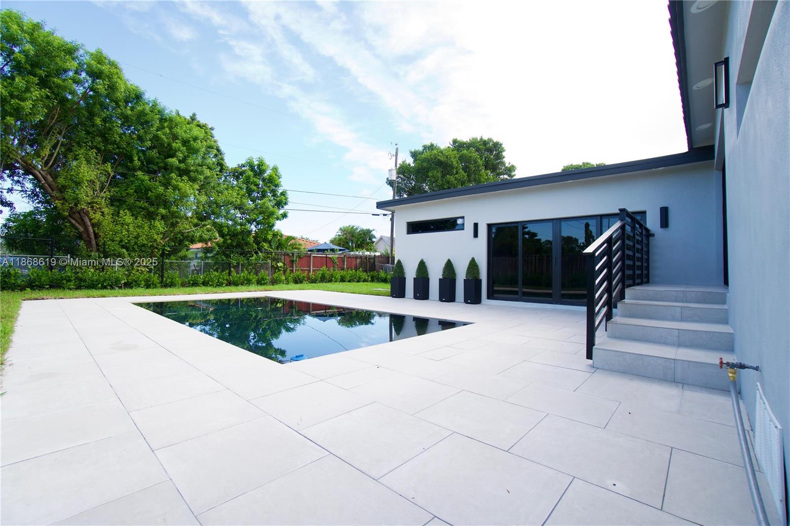 2155 Southwest 25th Terrace Miami, FL 33133 - Photo 3 of 20 a view of indoor pool and porch