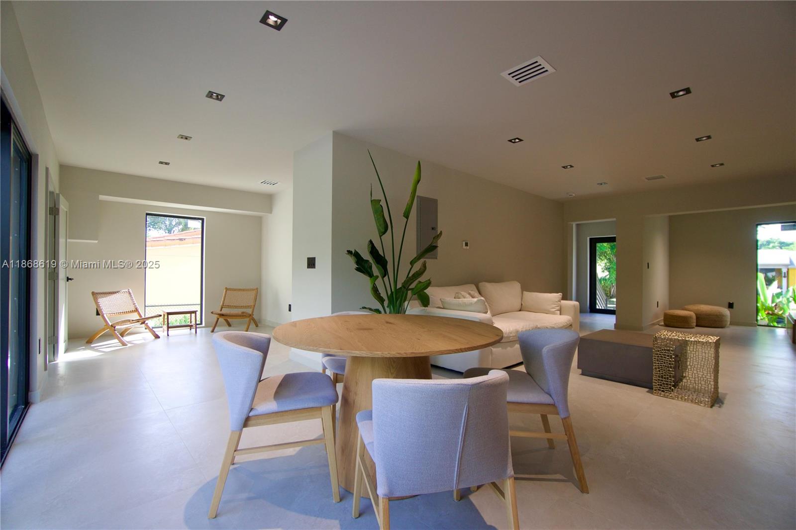 2155 Southwest 25th Terrace Miami, FL 33133 - Photo 4 of 20 a view of a dining room with furniture