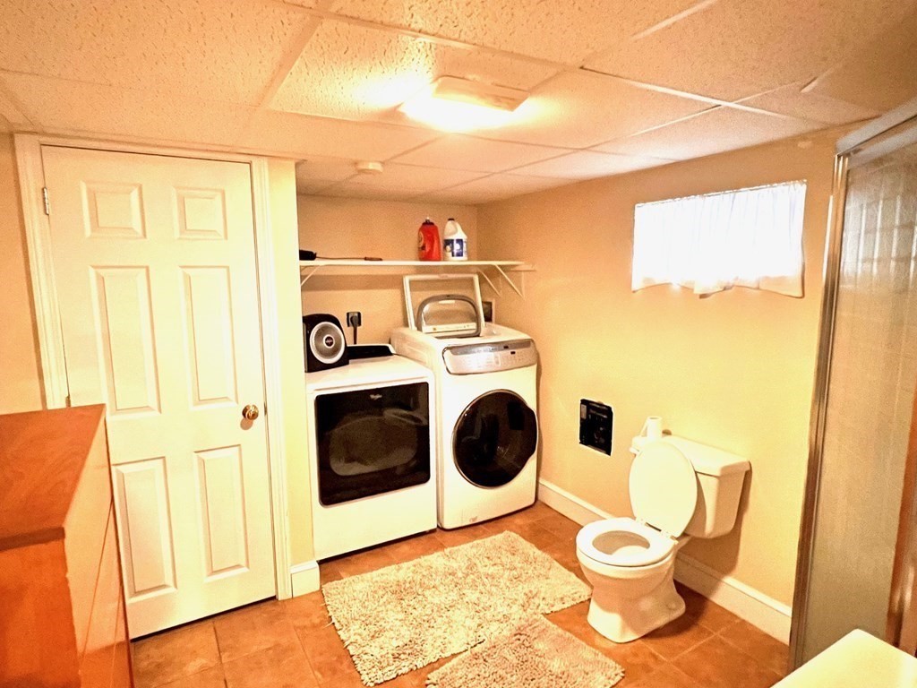 14 Sargent Street Winthrop, MA 02152 - Photo 16 of 17 a utility room with dryer and washer