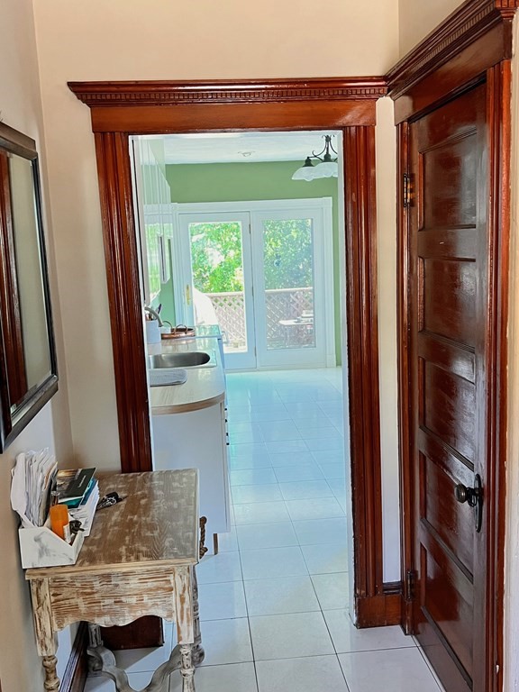 14 Sargent Street Winthrop, MA 02152 - Photo 6 of 17 a bedroom with a bed and a mirror