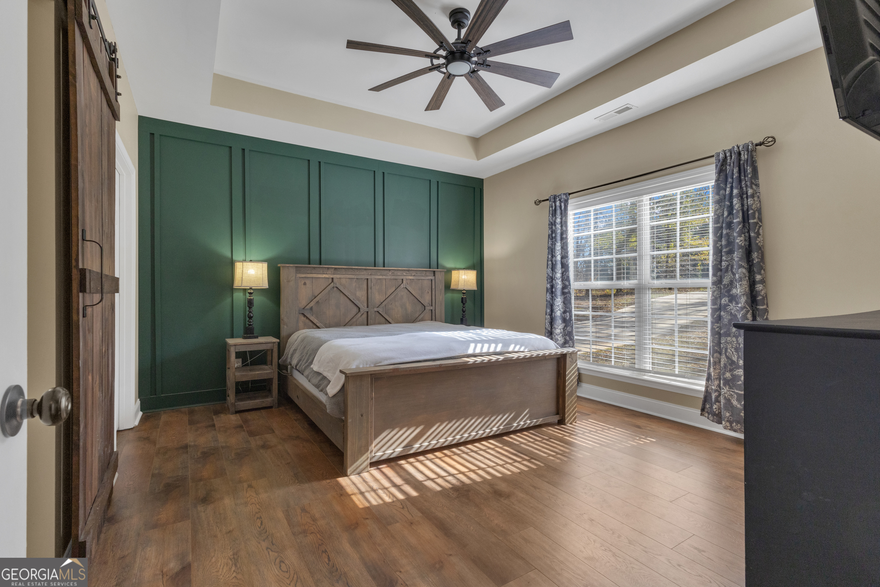 1135 Baptist Camp Road Griffin, GA 30223 - Photo 24 of 54 a bedroom with a bed and a window