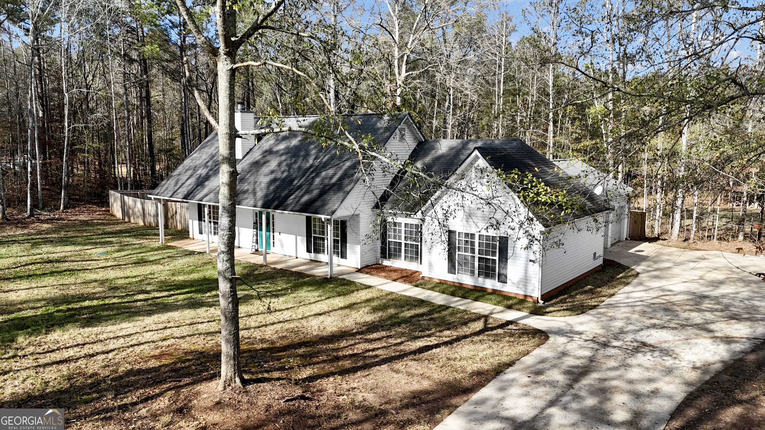 1135 Baptist Camp Road Griffin, GA 30223 - Photo 50 of 54 a front view of a house with a yard