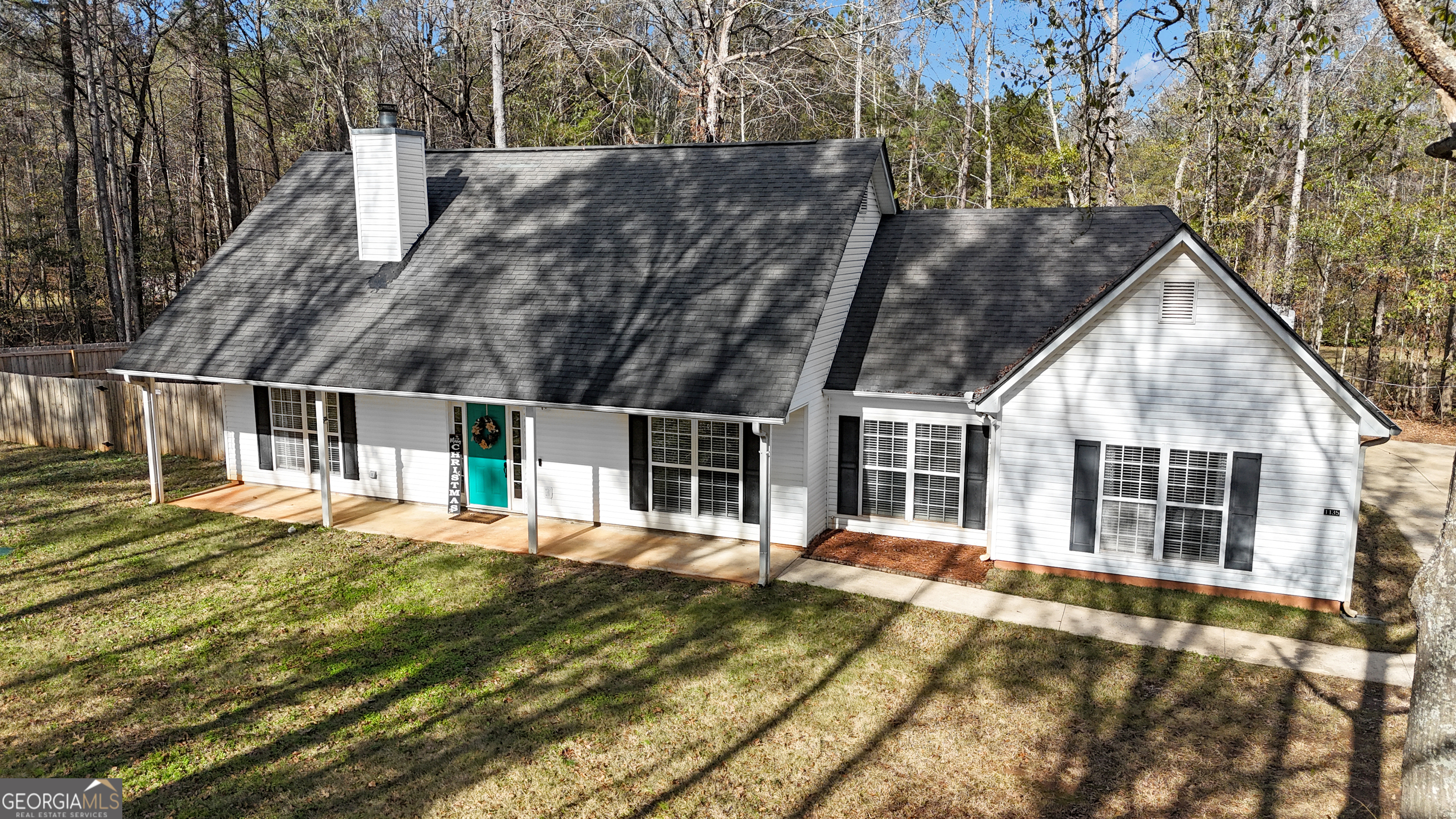 1135 Baptist Camp Road Griffin, GA 30223 - Photo 51 of 54 a front view of a house with a yard