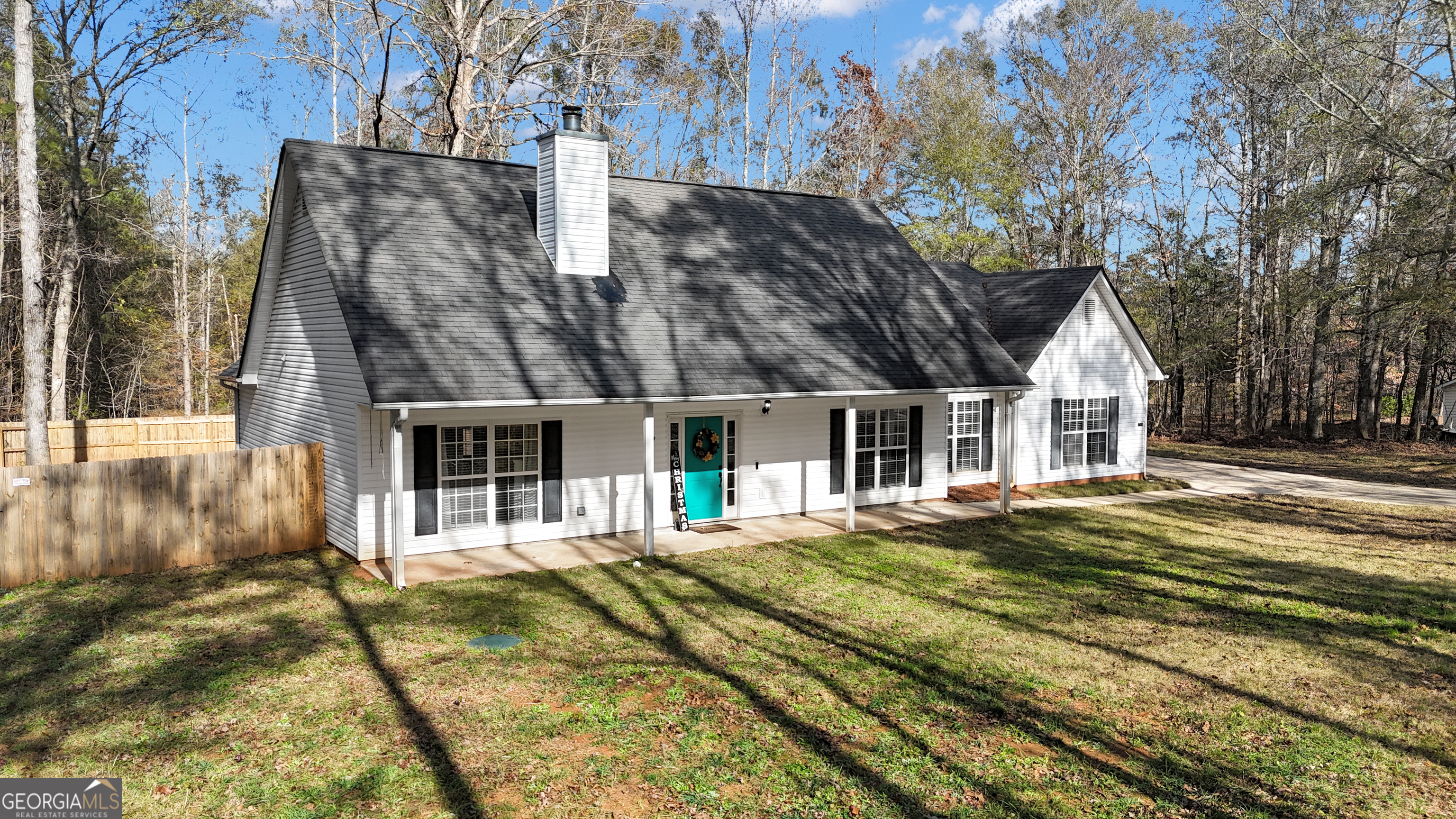 1135 Baptist Camp Road Griffin, GA 30223 - Photo 52 of 54 a front view of a house with a yard
