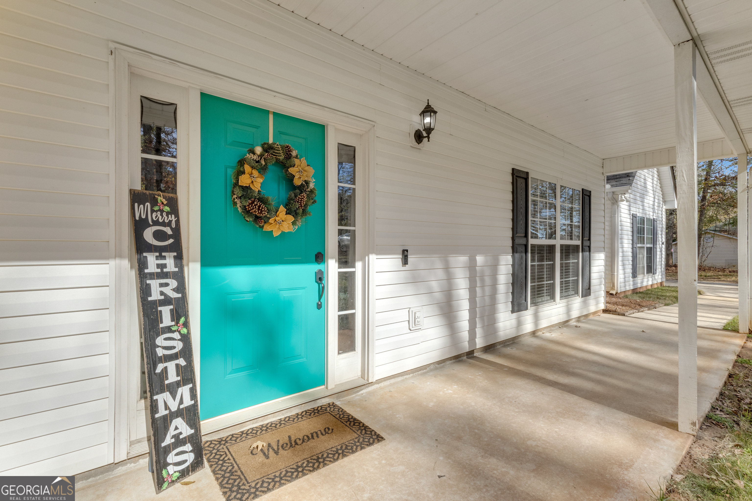 1135 Baptist Camp Road Griffin, GA 30223 - Photo 6 of 54 a view of a door and a window of the house
