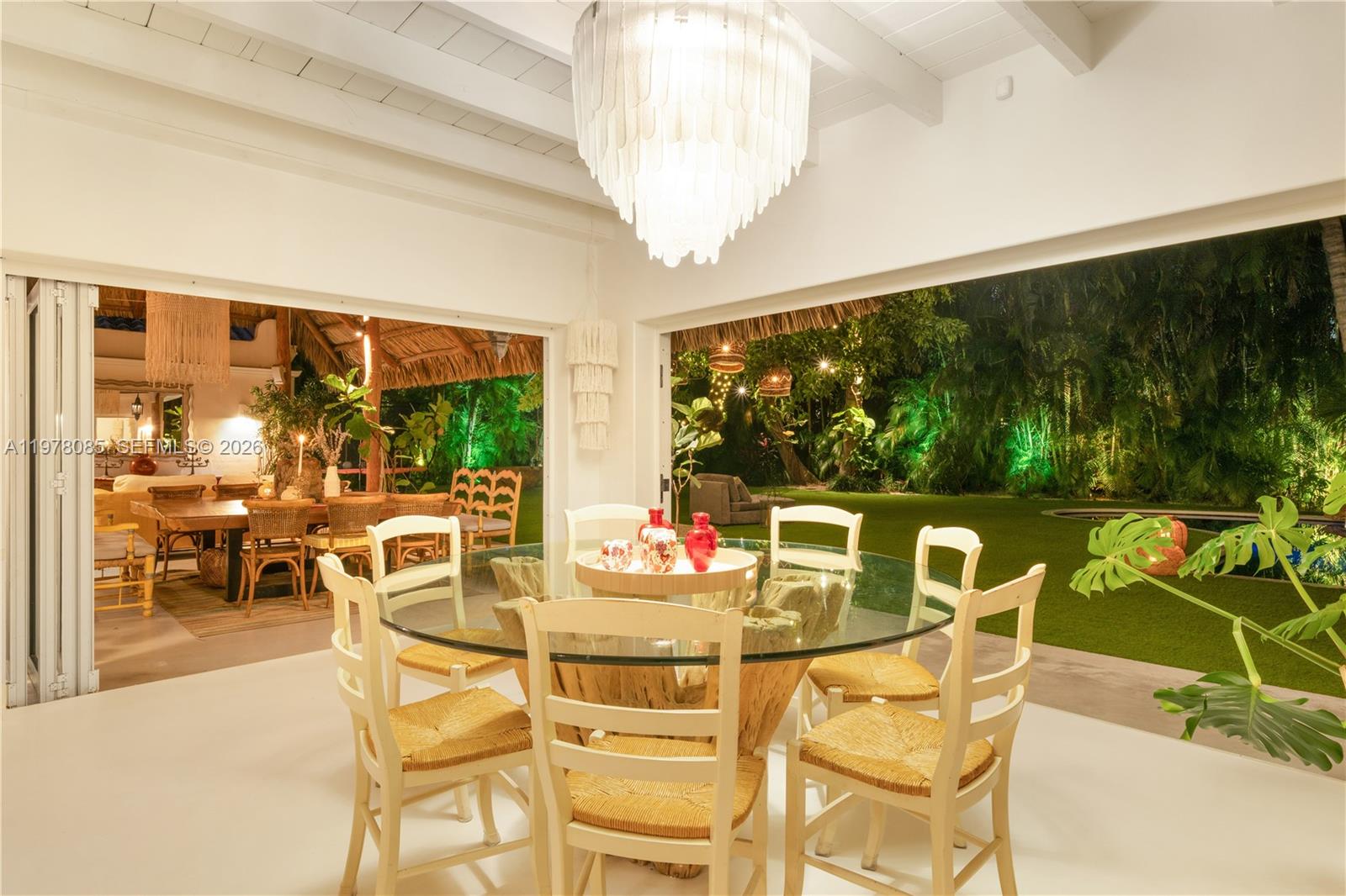 330 Gulf Road Key Biscayne, FL 33149 - Photo 30 of 46 a view of a dining room with furniture window and outside view