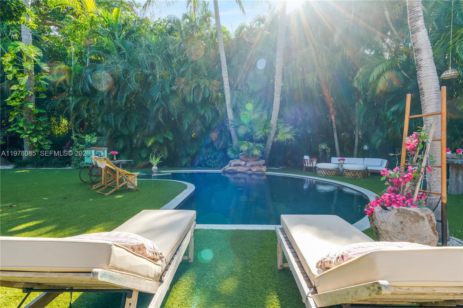 330 Gulf Road Key Biscayne, FL 33149 - Photo 37 of 46 a view of yard with seating area and trees around