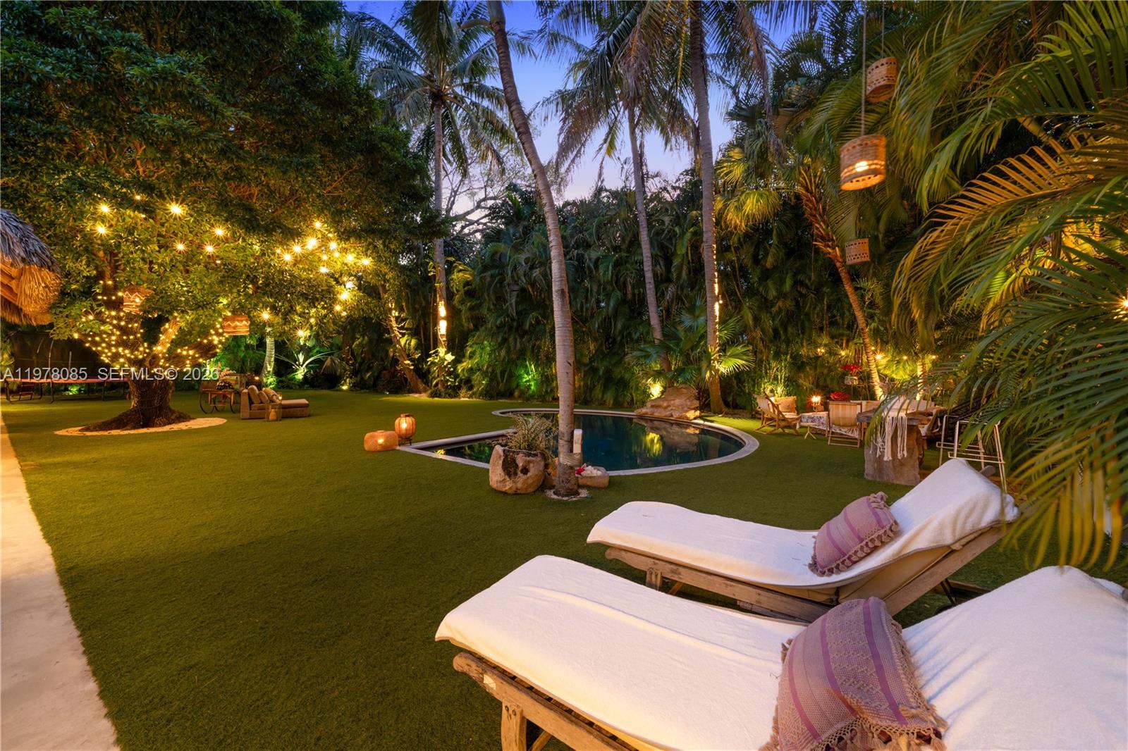 330 Gulf Road Key Biscayne, FL 33149 - Photo 4 of 46 a view of a yard with swimming pool