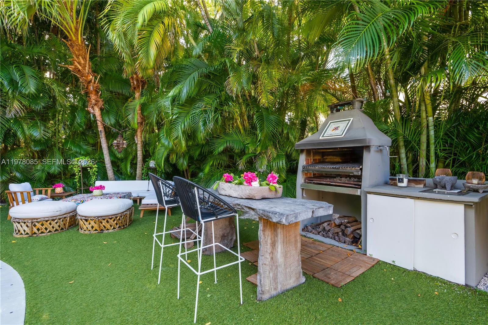 330 Gulf Road Key Biscayne, FL 33149 - Photo 41 of 46 a dining room with furniture and a garden