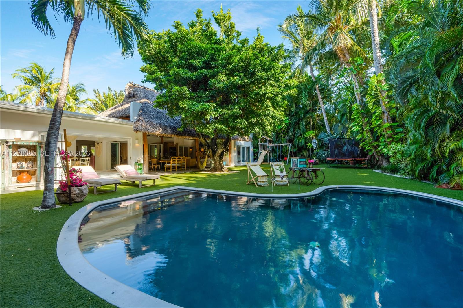 330 Gulf Road Key Biscayne, FL 33149 - Photo 43 of 46 a view of a house with swimming pool