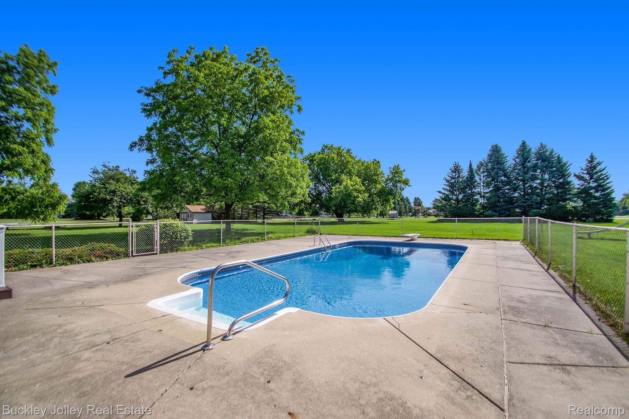 7755 Pettysville Road Pinckney, MI 48169 - Photo 3 of 21 Concrete Patio Surround