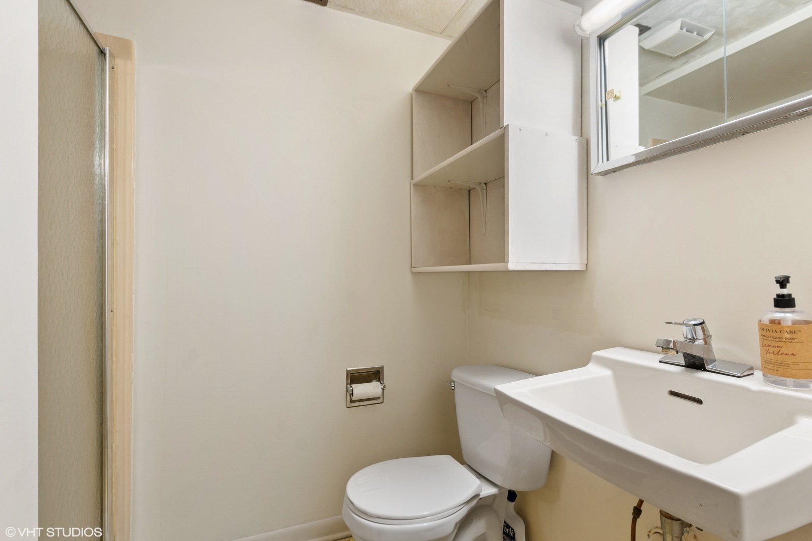 270 East Woodlawn Road, Unit 270 New Lenox, IL 60451 - Photo 11 of 14 a bathroom with a sink toilet and vanity